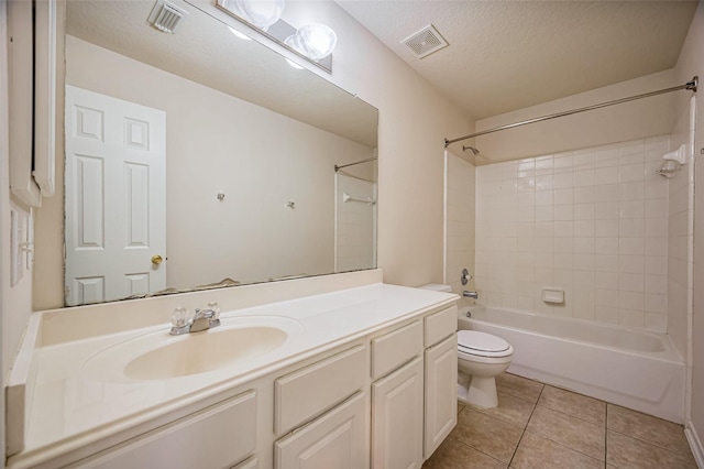 2107 Auburn Vale St, Katy, TX 77493 - bathroom featuring toilet, visible vents, tile patterned flooring, vanity, and bathing tub / shower combination