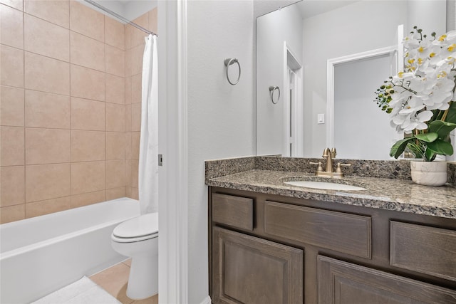 10610 Grace Hollow Dr, Cypress, TX 77433 - full bathroom with tile patterned floors, toilet, shower / tub combo with curtain, and vanity