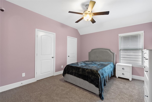 10610 Grace Hollow Dr, Cypress, TX 77433 - bedroom featuring baseboards, lofted ceiling, and carpet floors