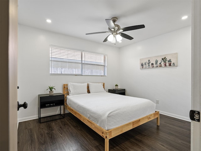 bedroom featuring baseboards, dark wood-type flooring, recessed lighting, and a ceiling fan