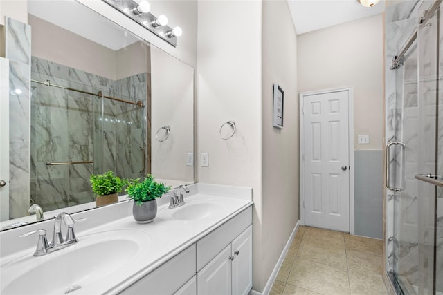 22022 Bridgestone Hawk Ct, Spring, TX 77388 - full bath with tile patterned floors, a marble finish shower, and a sink