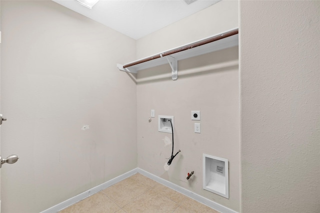 22022 Bridgestone Hawk Ct, Spring, TX 77388 - laundry room with light tile patterned floors, gas dryer hookup, hookup for a washing machine, hookup for an electric dryer, and laundry area
