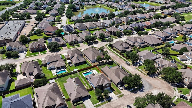 22022 Bridgestone Hawk Ct, Spring, TX 77388 - birds eye view of property featuring a water view and a residential view