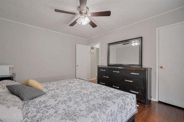 161281/2 Ridlon St, Channelview, TX 77530 - bedroom with ornamental molding, dark wood finished floors, and a ceiling fan