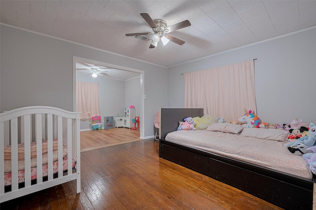 161281/2 Ridlon St, Channelview, TX 77530 - bedroom with ornamental molding, hardwood / wood-style flooring, and ceiling fan