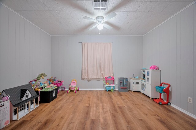 161281/2 Ridlon St, Channelview, TX 77530 - recreation room with wood finished floors, ornamental molding, and ceiling fan