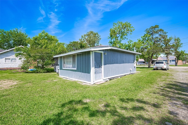 161281/2 Ridlon St, Channelview, TX 77530 - view of home's exterior featuring a lawn