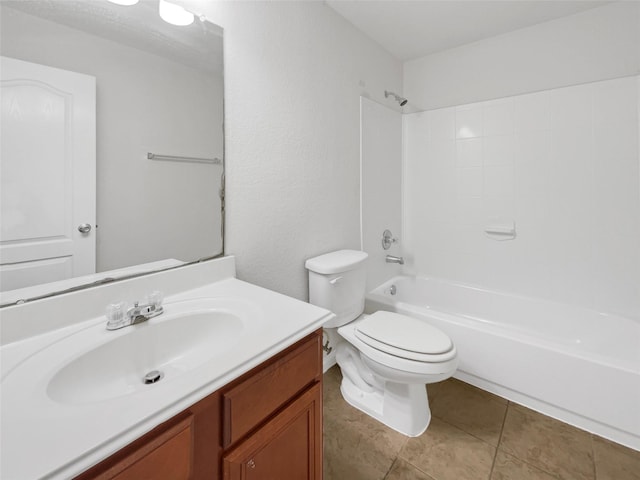 bathroom featuring shower / bath combination, vanity, toilet, and tile patterned flooring