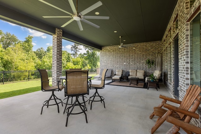 8642 Burdekin Rd, Magnolia, TX 77354 - view of patio featuring ceiling fan and fence