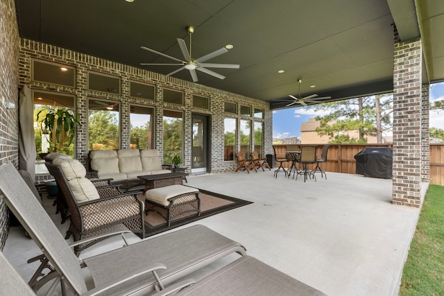 8642 Burdekin Rd, Magnolia, TX 77354 - view of patio with an outdoor hangout area, ceiling fan, grilling area, and fence