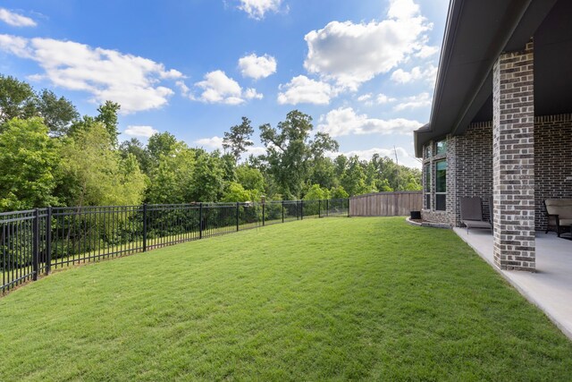 8642 Burdekin Rd, Magnolia, TX 77354 - view of yard featuring a patio area