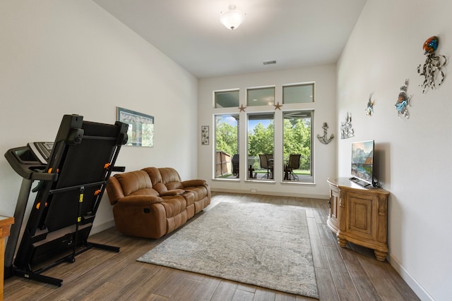 8642 Burdekin Rd, Magnolia, TX 77354 - living room with wood finished floors and baseboards