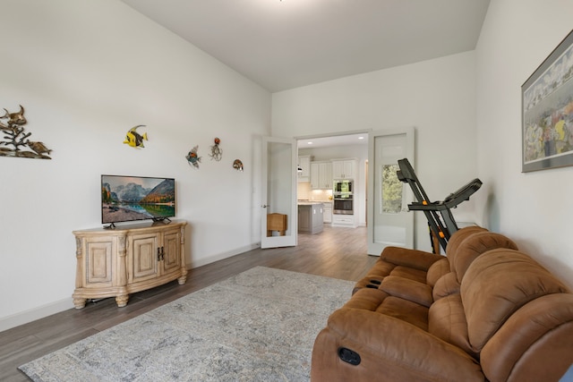 8642 Burdekin Rd, Magnolia, TX 77354 - living area with wood finished floors and baseboards
