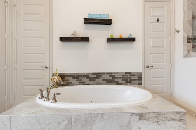 8642 Burdekin Rd, Magnolia, TX 77354 - full bathroom featuring a whirlpool tub