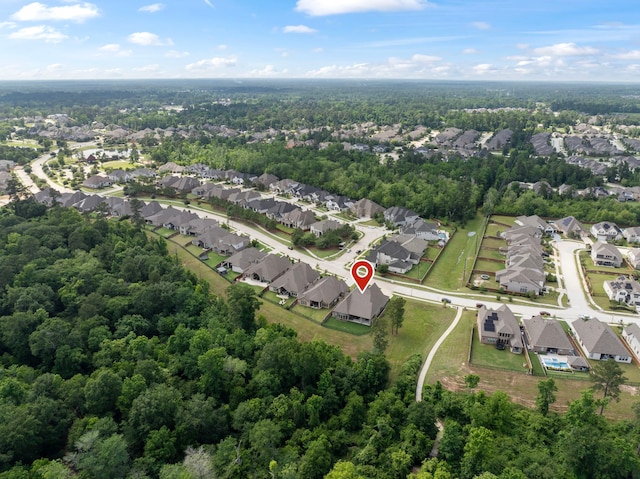 8642 Burdekin Rd, Magnolia, TX 77354 - aerial overview of property's location featuring nearby suburban area and a heavily wooded area