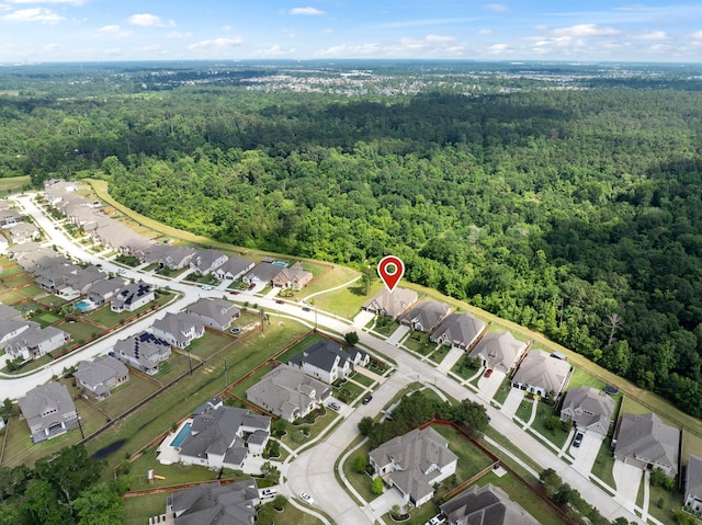8642 Burdekin Rd, Magnolia, TX 77354 - aerial view of property and surrounding area with a heavily wooded area, nearby suburban area, and property parcel outlined