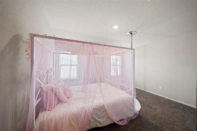 327 Pecos Dr, Huntsville, TX 77340 - carpeted bedroom featuring baseboards
