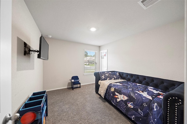327 Pecos Dr, Huntsville, TX 77340 - bedroom with carpet, baseboards, and recessed lighting