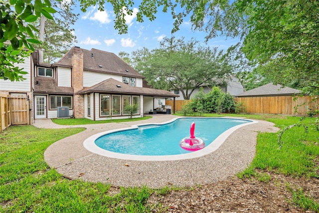 5502 Graystone Ln, Houston, TX 77069 - view of pool with a yard, a fenced in pool, a patio area, central AC unit, and a fenced backyard