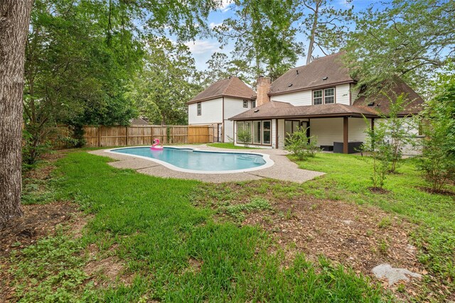 5502 Graystone Ln, Houston, TX 77069 - view of pool featuring a fenced backyard, a patio, a fenced in pool, and a lawn