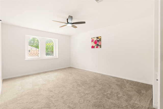 5502 Graystone Ln, Houston, TX 77069 - spare room with carpet floors, a ceiling fan, and baseboards