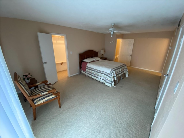 bedroom with carpet flooring, ceiling fan, and baseboards