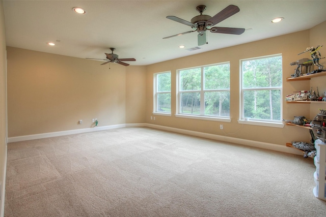1634 Topaz Trl, Willis, TX 77378 - carpeted spare room with baseboards, ceiling fan, and recessed lighting