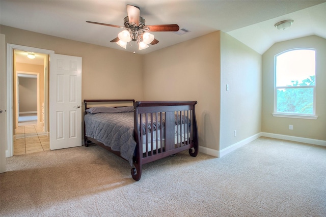 1634 Topaz Trl, Willis, TX 77378 - bedroom featuring carpet flooring, a ceiling fan, baseboards, and vaulted ceiling