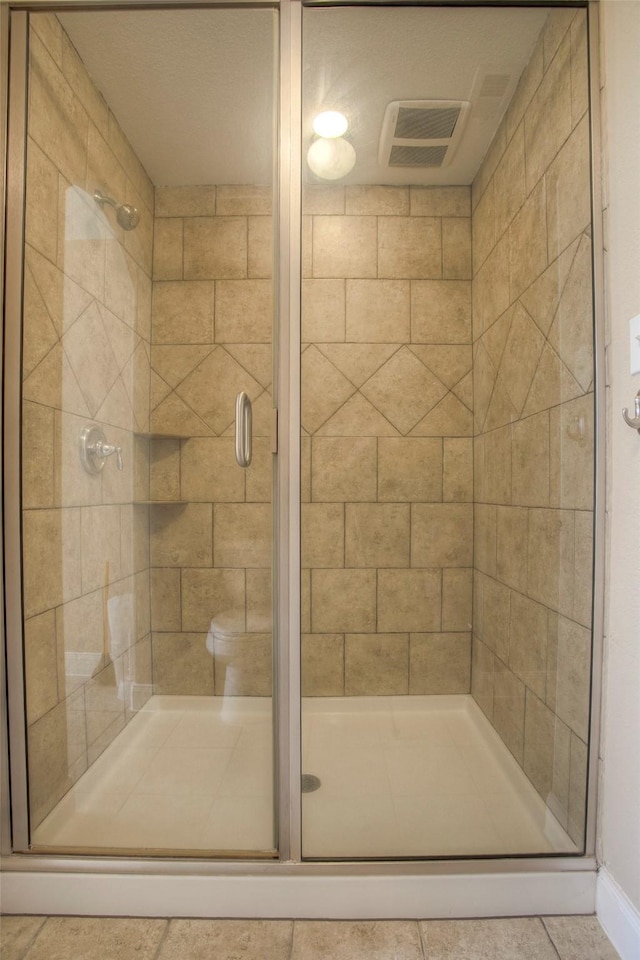 1634 Topaz Trl, Willis, TX 77378 - bathroom with tile patterned floors and a shower stall
