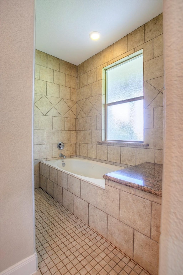 1634 Topaz Trl, Willis, TX 77378 - full bath with a bath and tile patterned flooring
