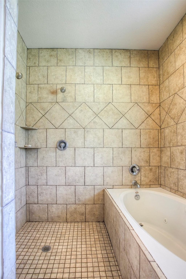 1634 Topaz Trl, Willis, TX 77378 - bathroom featuring a tile shower and a whirlpool tub