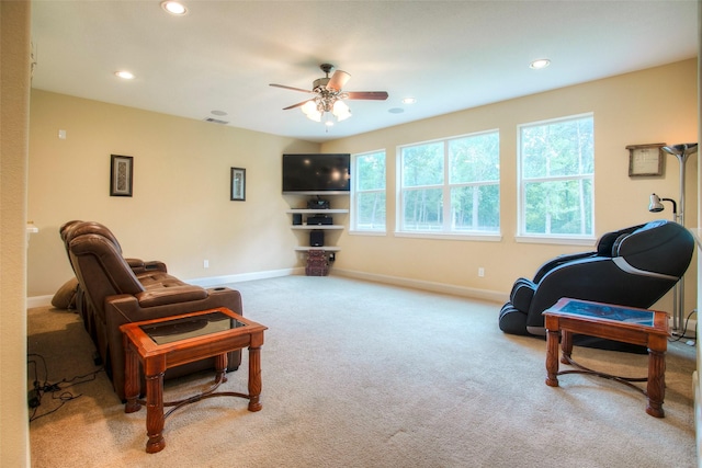 1634 Topaz Trl, Willis, TX 77378 - carpeted living area featuring ceiling fan, recessed lighting, and baseboards