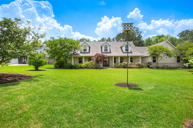 1634 Topaz Trl, Willis, TX 77378 - cape cod home featuring a front yard