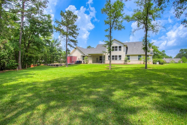 1634 Topaz Trl, Willis, TX 77378 - view of grassy yard