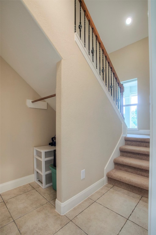 1634 Topaz Trl, Willis, TX 77378 - stairway featuring tile patterned flooring and baseboards