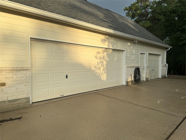 1634 Topaz Trl, Willis, TX 77378 - garage featuring driveway