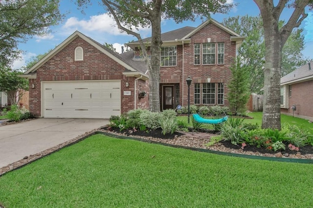 traditional-style home with an attached garage, fence, a front lawn, brick siding, and driveway