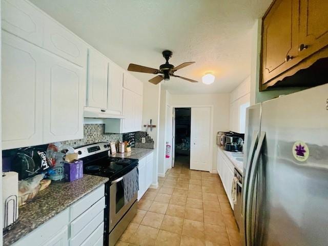 2122 Clemson Dr, Katy, TX 77493 - kitchen featuring white cabinetry, ceiling fan, under cabinet range hood, appliances with stainless steel finishes, and tasteful backsplash