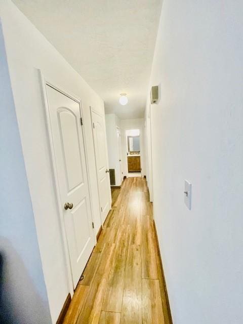 2122 Clemson Dr, Katy, TX 77493 - hallway featuring light wood-type flooring