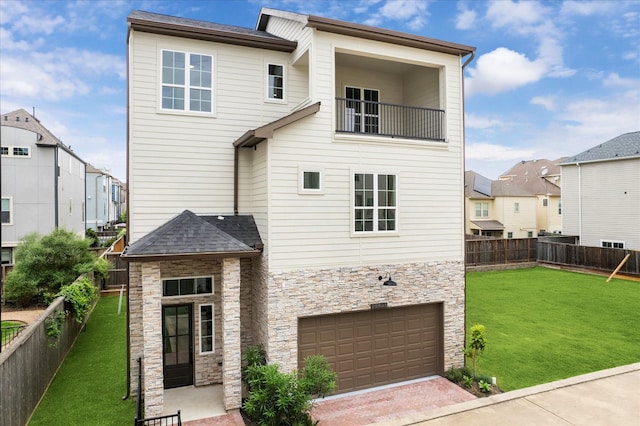 10935 Brookeshire Chase Ln, Houston, TX 77043 - back of property with stone siding, an attached garage, a residential view, and decorative driveway