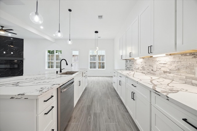 10935 Brookeshire Chase Ln, Houston, TX 77043 - kitchen with a sink, dishwasher, decorative backsplash, and white cabinetry