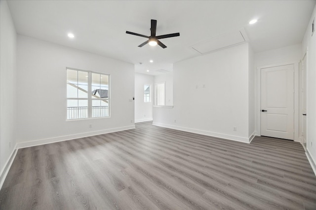 10935 Brookeshire Chase Ln, Houston, TX 77043 - unfurnished living room featuring attic access, ceiling fan, wood finished floors, recessed lighting, and baseboards