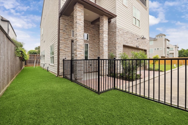 10935 Brookeshire Chase Ln, Houston, TX 77043 - view of home's exterior featuring an attached garage and stone siding