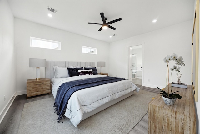 10935 Brookeshire Chase Ln, Houston, TX 77043 - bedroom featuring wood finished floors, baseboards, connected bathroom, and recessed lighting
