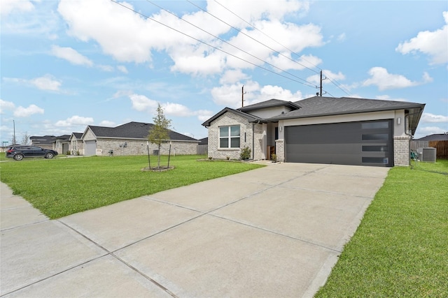 30102 Reagans Ranch Dr, Katy, TX 77494 - view of front of house with driveway, brick siding, an attached garage, central AC unit, and a front yard
