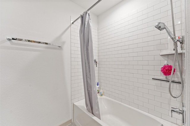 30102 Reagans Ranch Dr, Katy, TX 77494 - full bathroom featuring baseboards and shower / bath combo with shower curtain
