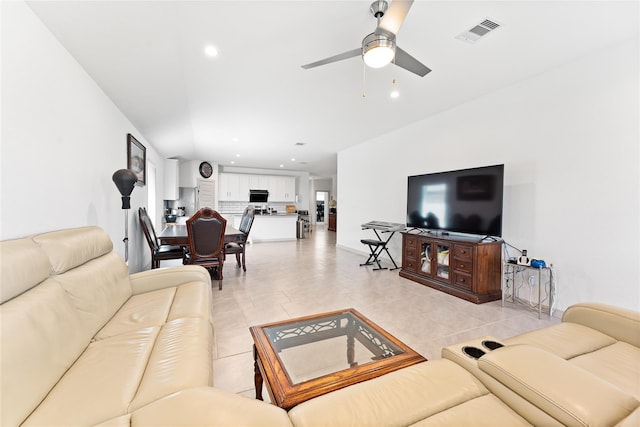 30102 Reagans Ranch Dr, Katy, TX 77494 - living area featuring a ceiling fan, recessed lighting, light tile patterned floors, and visible vents