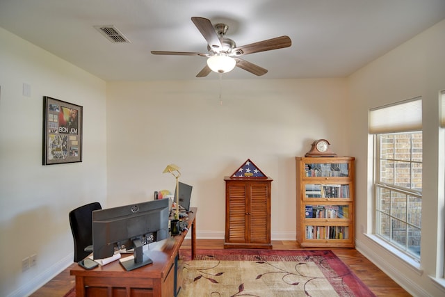4803 Birch Grove Dr, Fulshear, TX 77441 - office with a ceiling fan, baseboards, and wood finished floors