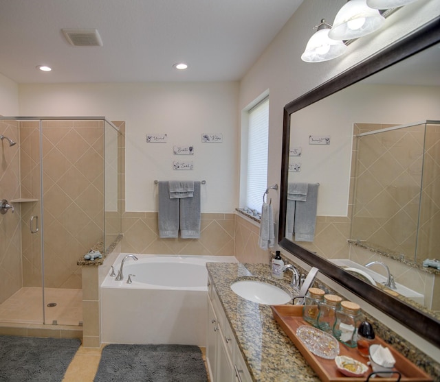 4803 Birch Grove Dr, Fulshear, TX 77441 - bathroom featuring vanity, a garden tub, a stall shower, tile patterned floors, and recessed lighting