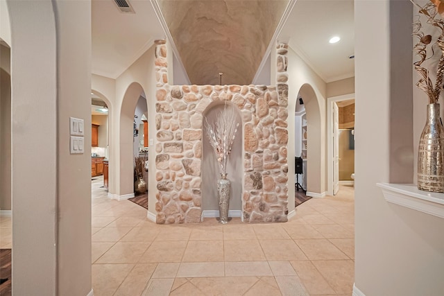 122 Marble Staff Ct, Houston, TX 77069 - corridor with arched walkways, ornamental molding, baseboards, tile patterned floors, and recessed lighting